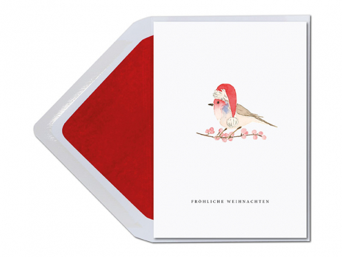 In Auquarellfarben gemalter Vogel mit Weihnachtsmütze auf einem Beerenzweig. Gedruckt auf Feinstpapier inkl. Umschlag.
