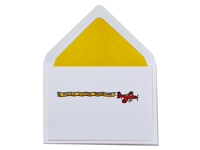 Geburtskarte mit rotem Doppeldecker und gelb gefüttertem Briefumschlag.